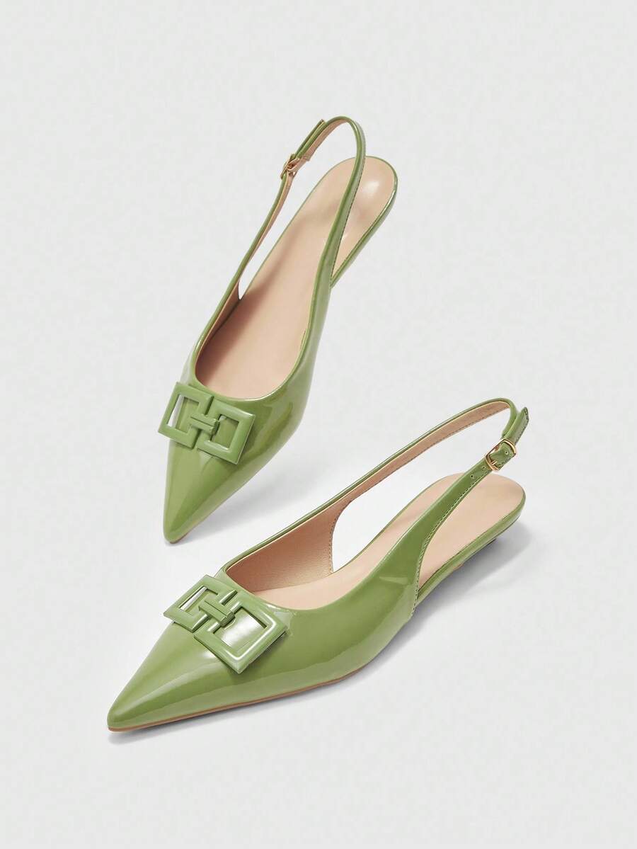 Women's pointed toe low wedge flat shoes crafted in PU leather with a slingback strap and stylish metal buckle detail.