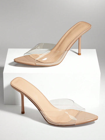 Women's pointed toe stiletto high heel wedding shoes featuring an elegant silhouette and glossy finish.