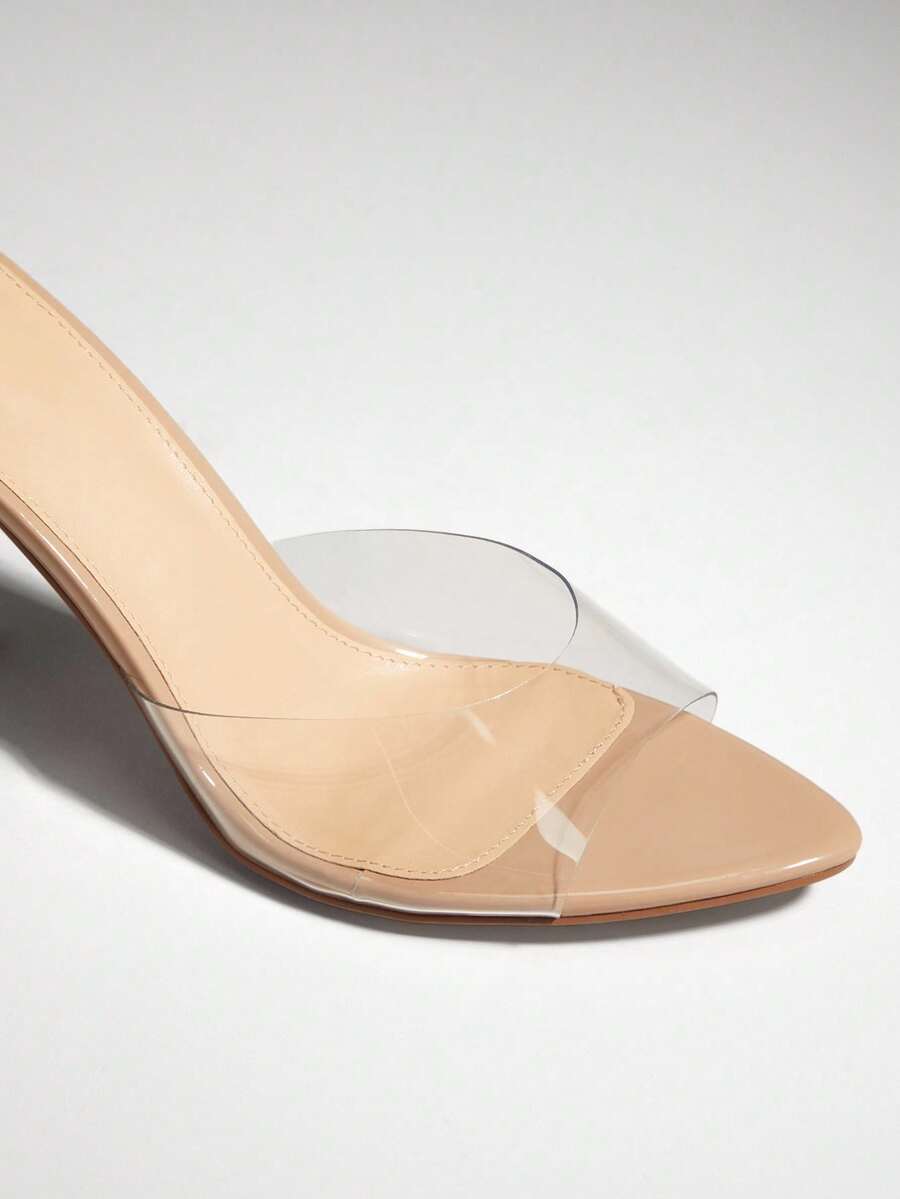 Women's pointed toe stiletto high heel wedding shoes featuring an elegant silhouette and glossy finish.