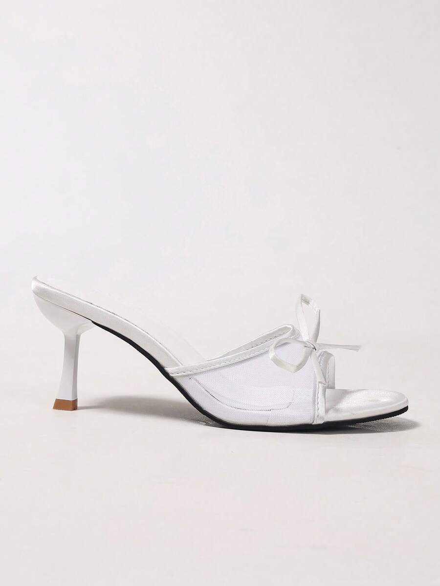Women's black open toe mesh slide sandals with bowknot detail and stiletto heels