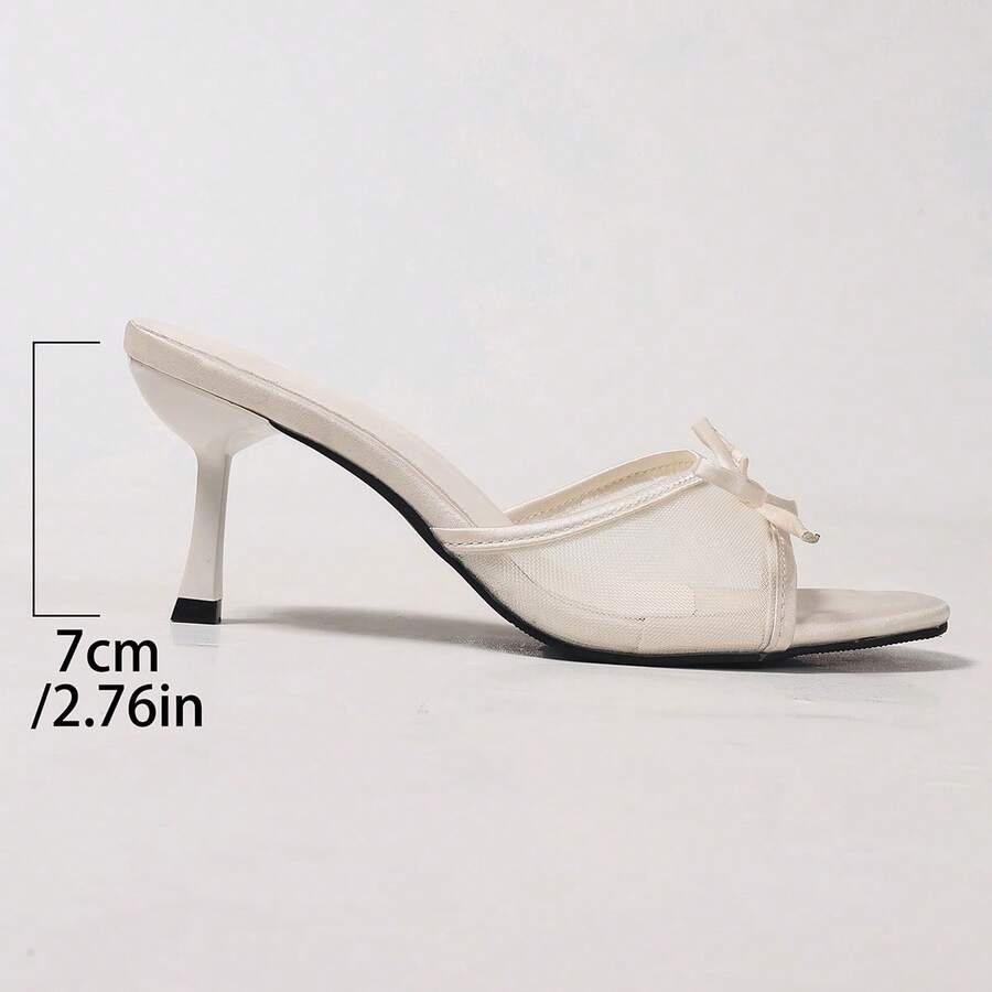 Women's black open toe mesh slide sandals with bowknot detail and stiletto heels