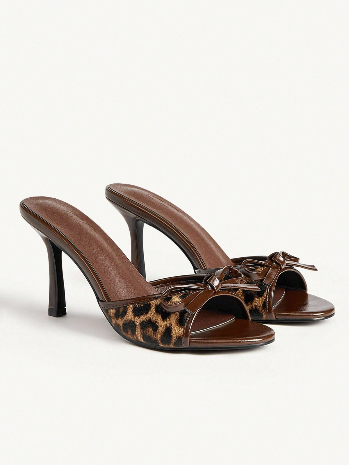 Women's black open-toe stiletto mule high heel sandals with bow detail