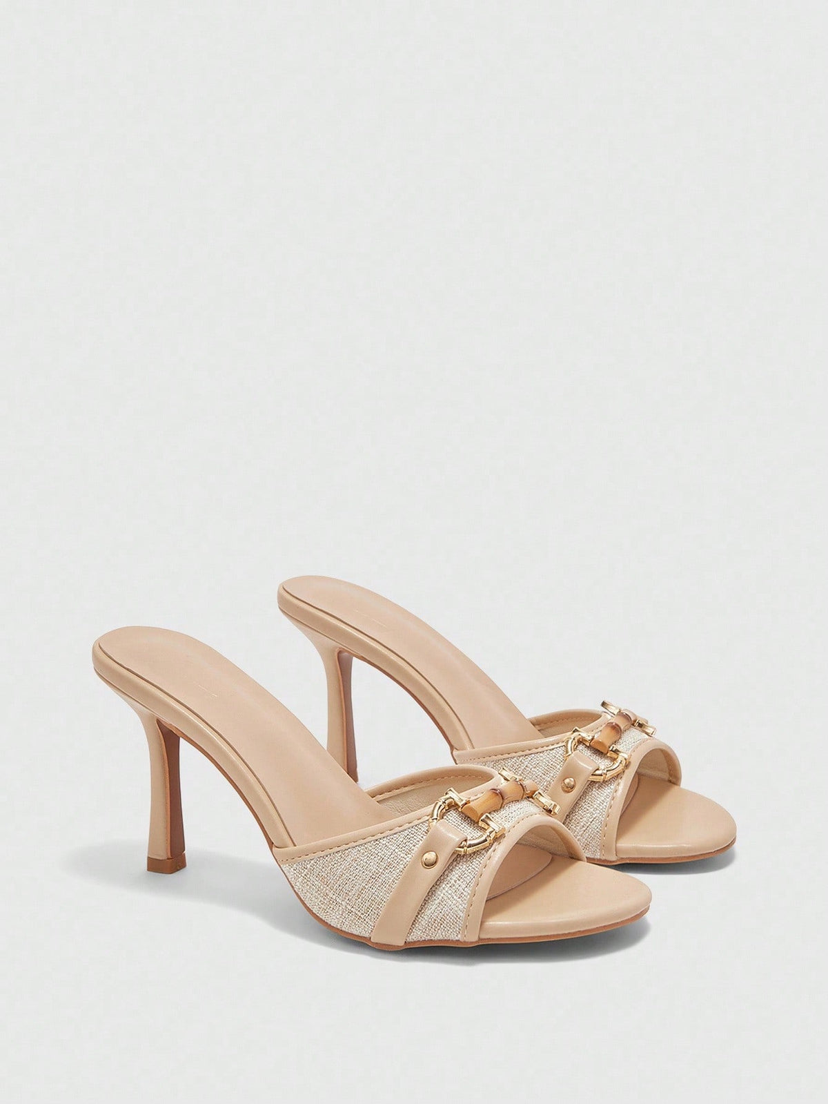 Women's beige high heel mule sandals with open round toe and metal chain detail