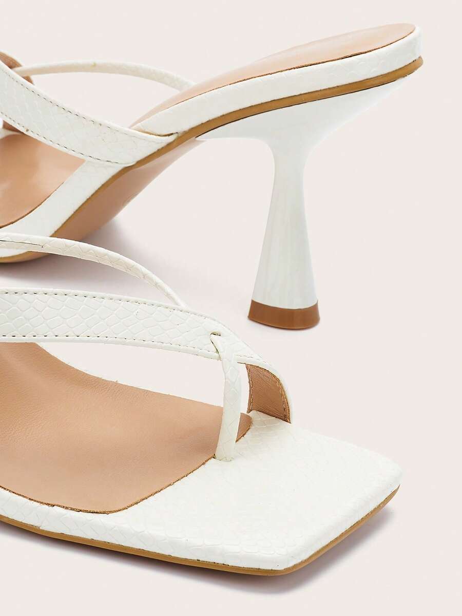 Women's yellow open toe high-heeled sandals with stiletto heel and slip-on mule design