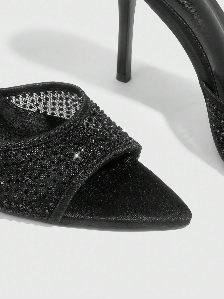 Women's black high heel sandals featuring contrast mesh upper, rhinestone embellishments, and a stiletto heel.
