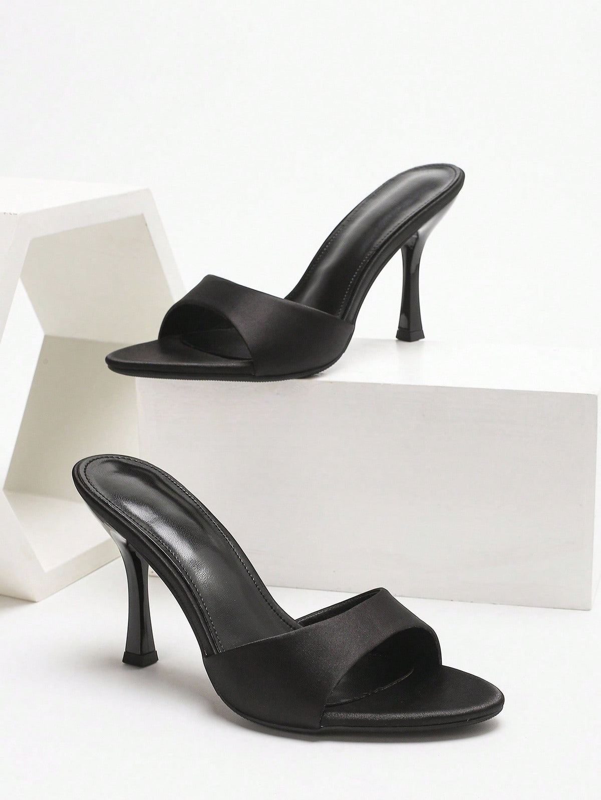 Women's open toe high heel sandals with slingback strap and sleek stiletto heel in smooth PU leather.