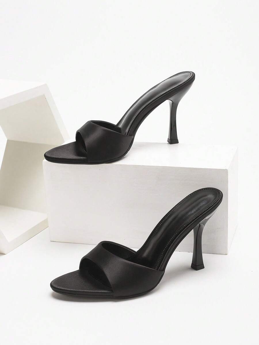 Women's open toe high heel sandals with slingback strap and sleek stiletto heel in smooth PU leather.