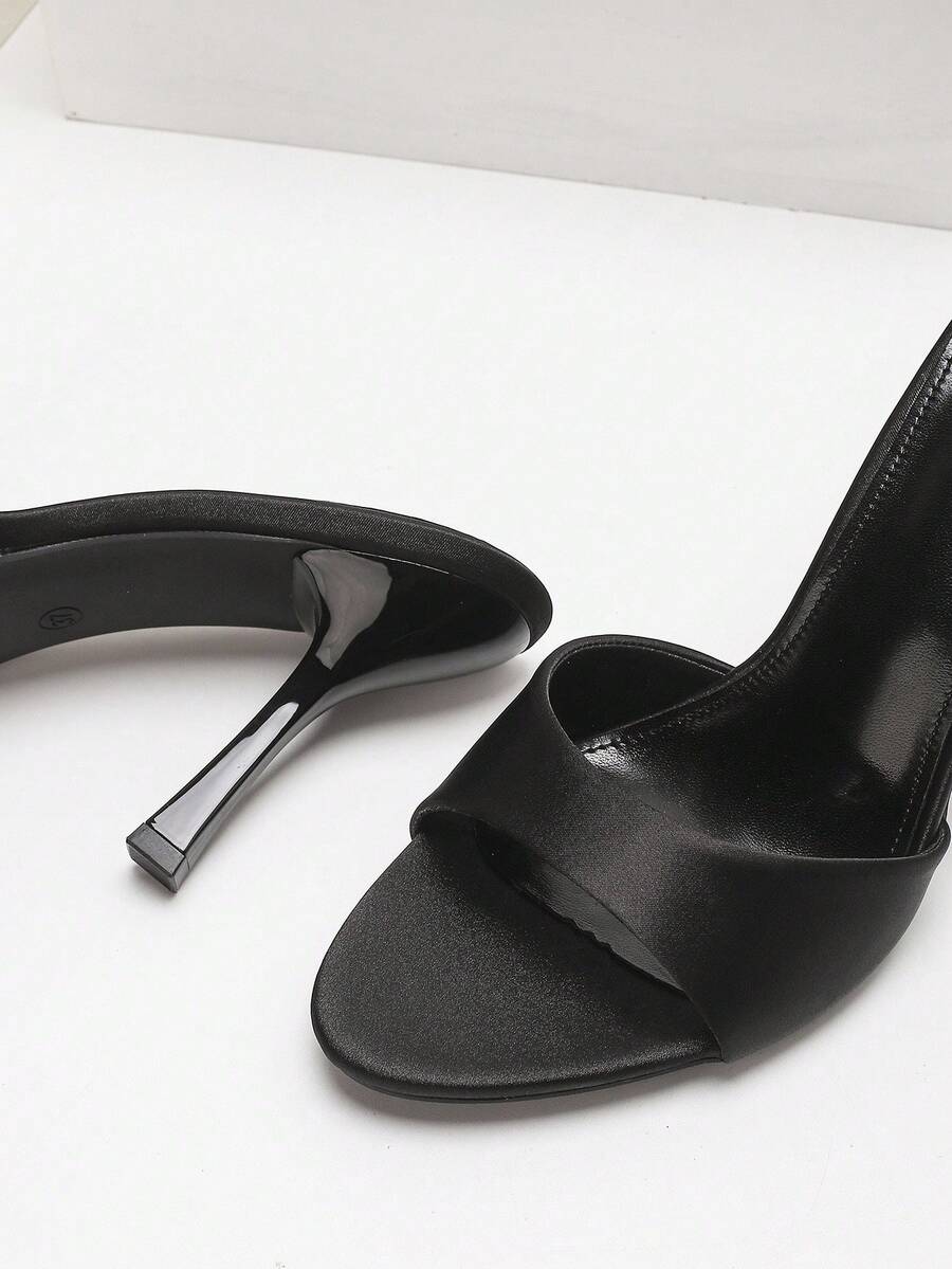 Women's open toe high heel sandals with slingback strap and sleek stiletto heel in smooth PU leather.