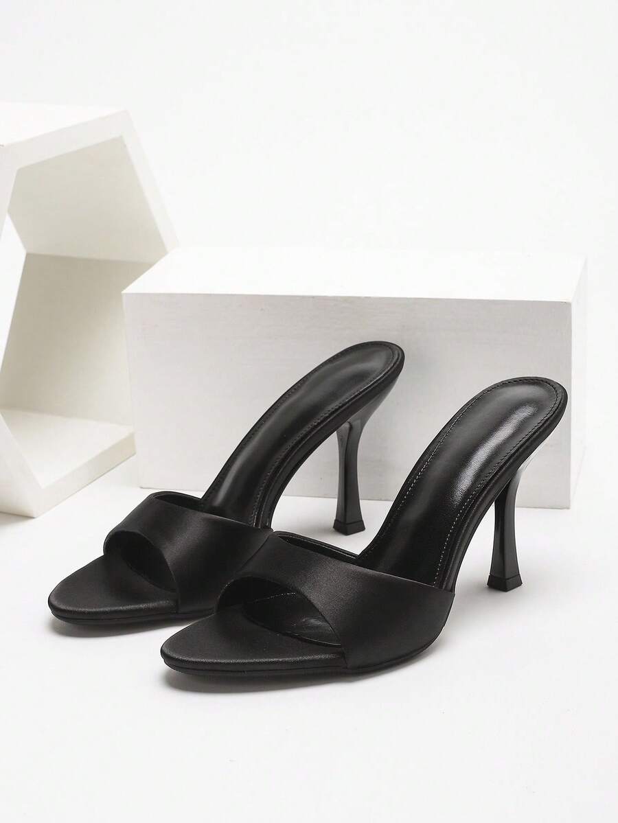 Women's open toe high heel sandals with slingback strap and sleek stiletto heel in smooth PU leather.