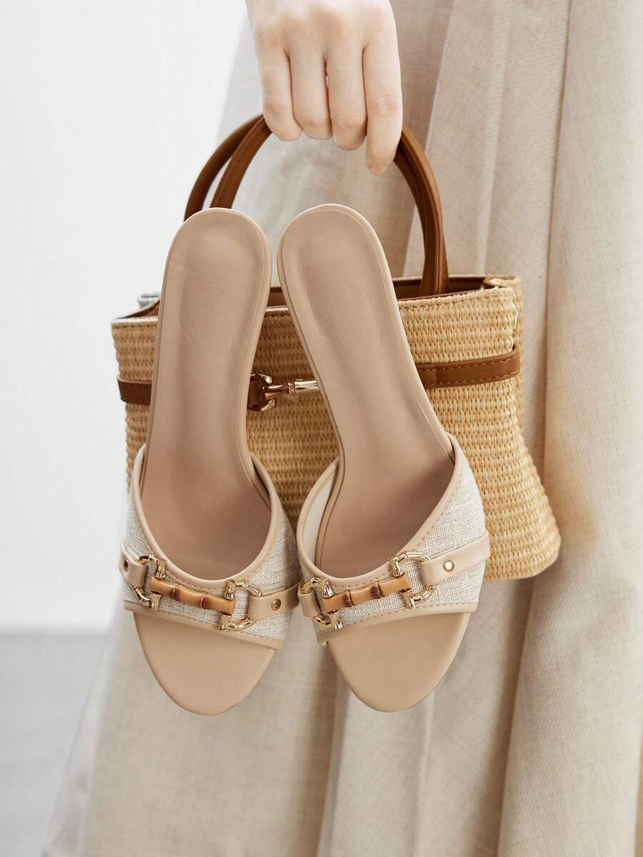 Women's beige high heel mule sandals with open round toe and metal chain detail