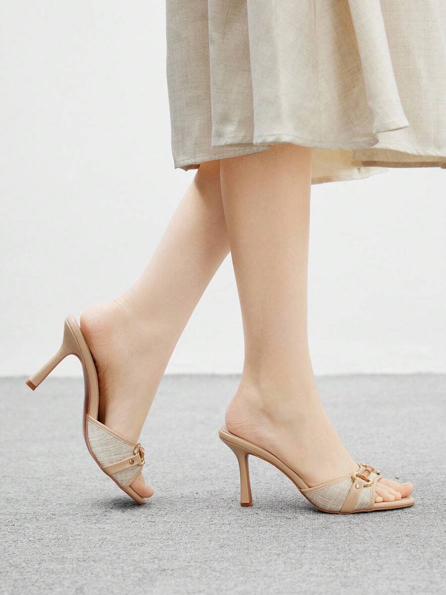 Women's beige high heel mule sandals with open round toe and metal chain detail