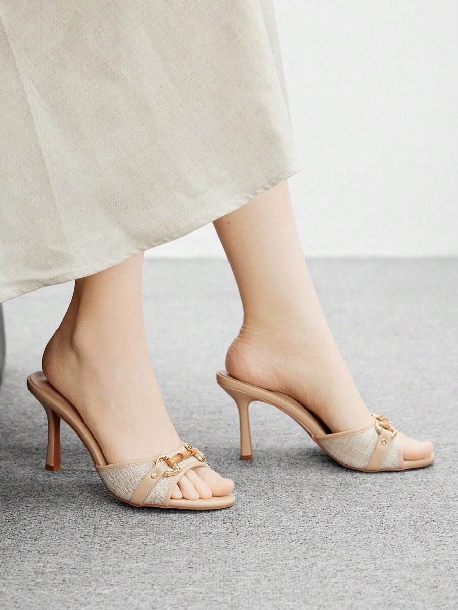 Women's beige high heel mule sandals with open round toe and metal chain detail
