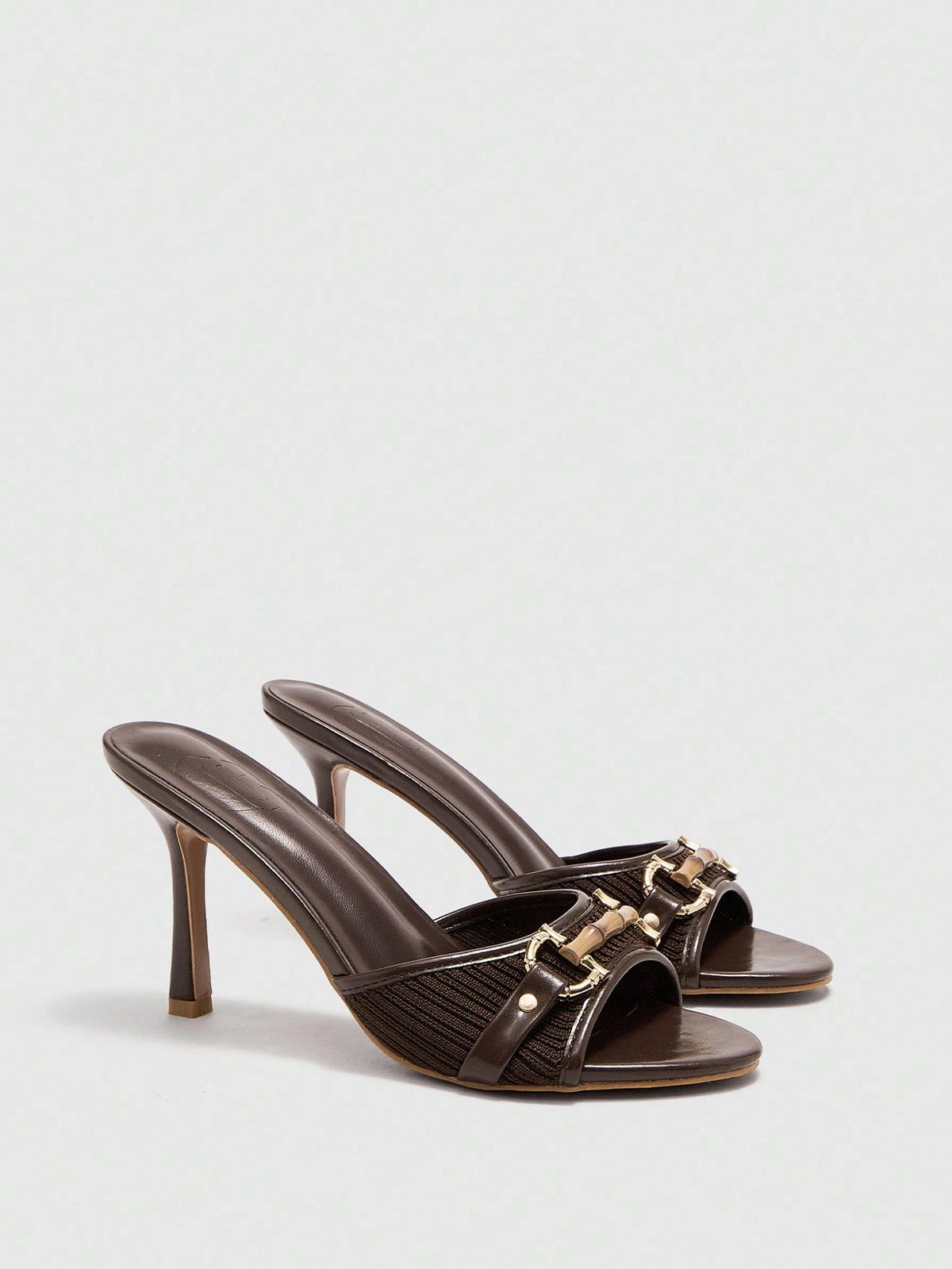 Women's beige high heel mule sandals with open round toe and metal chain detail