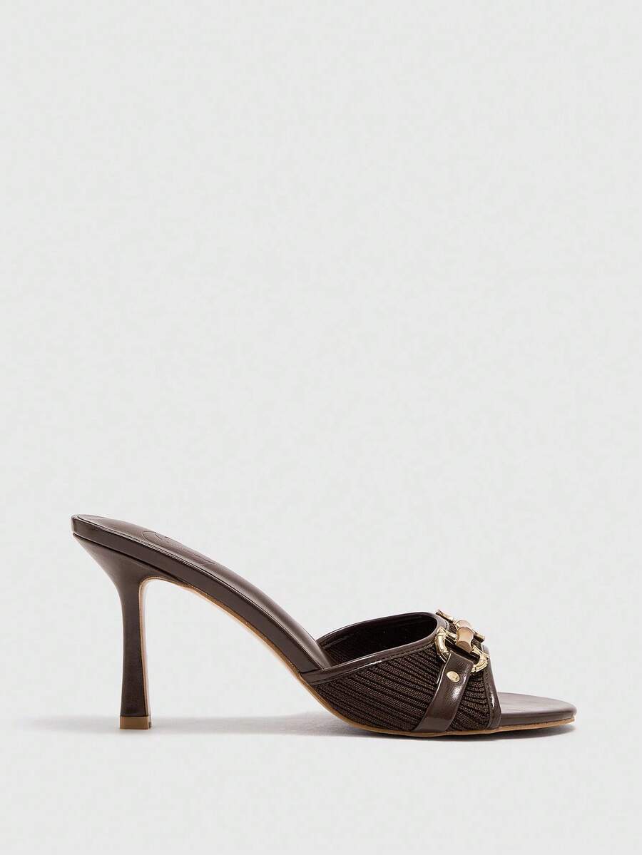Women's beige high heel mule sandals with open round toe and metal chain detail