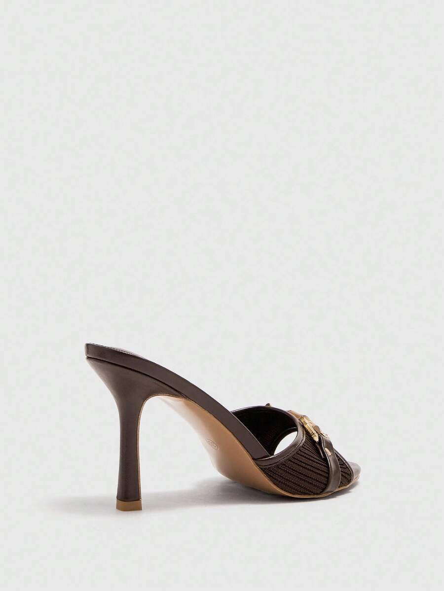 Women's beige high heel mule sandals with open round toe and metal chain detail