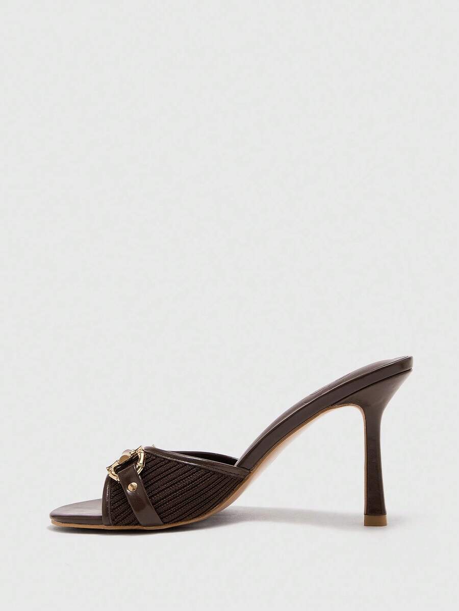 Women's beige high heel mule sandals with open round toe and metal chain detail