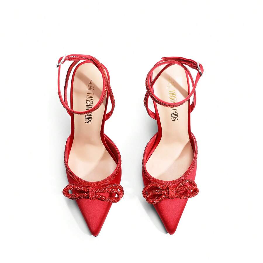Women's rhinestone ankle strap high heels with pointed closed toe, strappy bow details, and stiletto heel for wedding and prom wear.