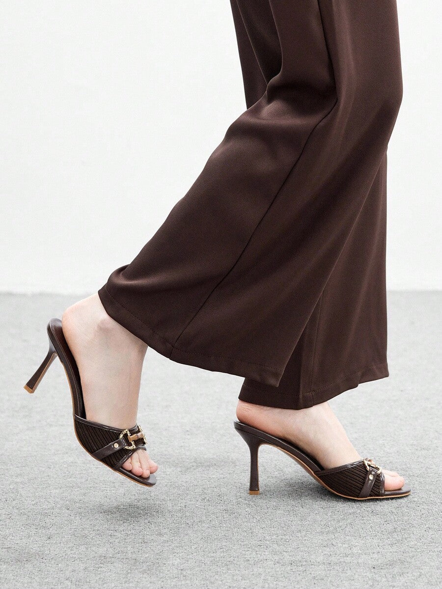 Women's beige high heel mule sandals with open round toe and metal chain detail