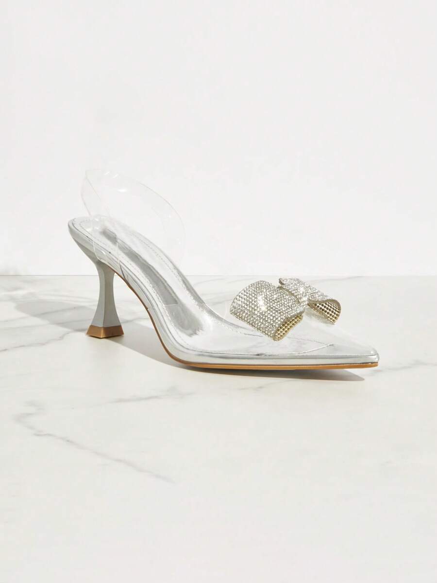 Women's pointed toe stiletto high heel wedding shoes featuring an elegant silhouette and glossy finish.
