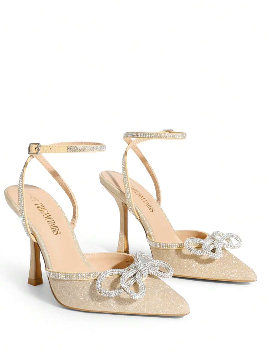 Women's rhinestone ankle strap high heels with pointed closed toe, strappy bow details, and stiletto heel for wedding and prom wear.
