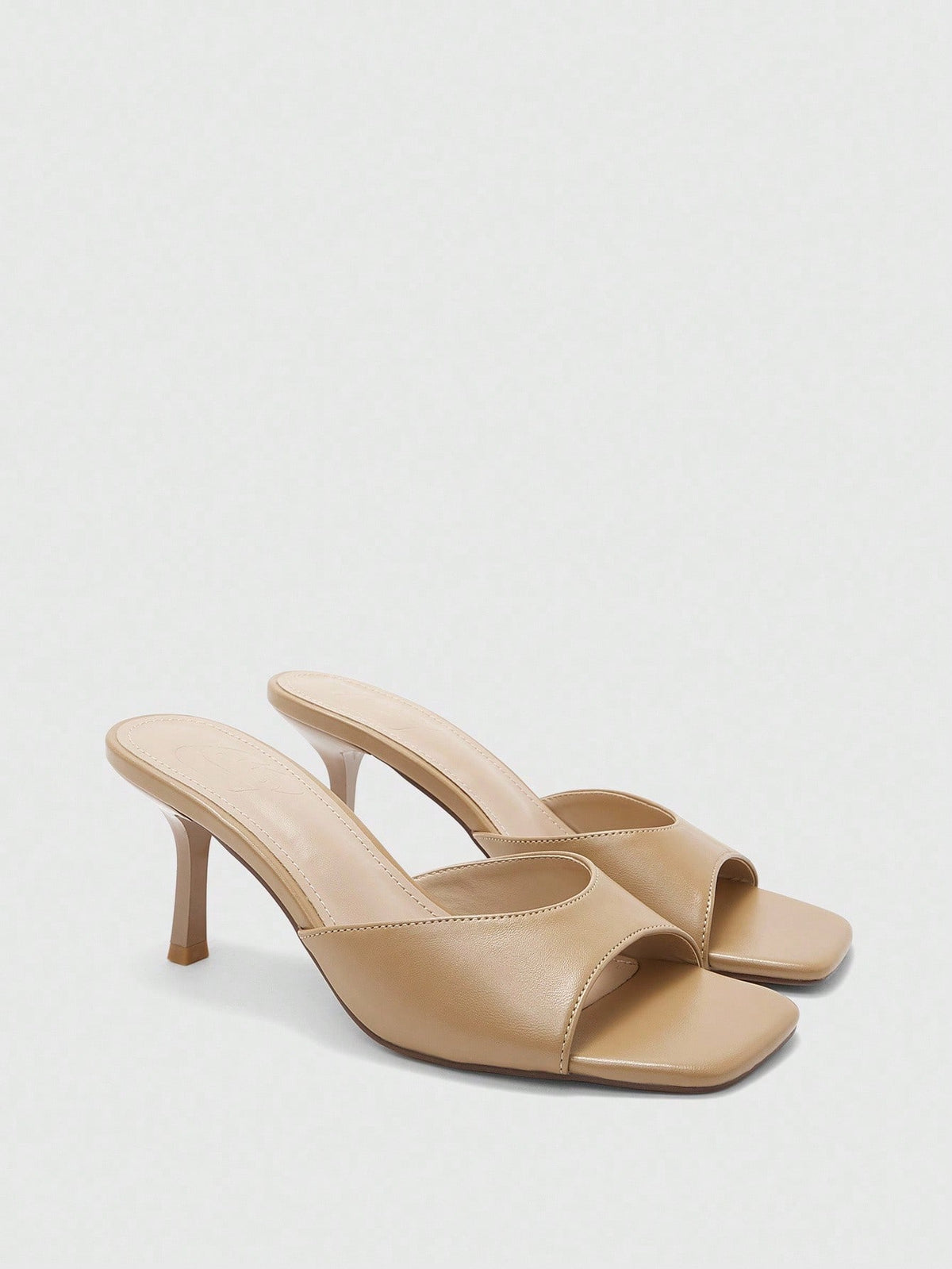 Women's black square toe high heel sandals featuring an open toe design, thin stiletto heel, and slingback strap.