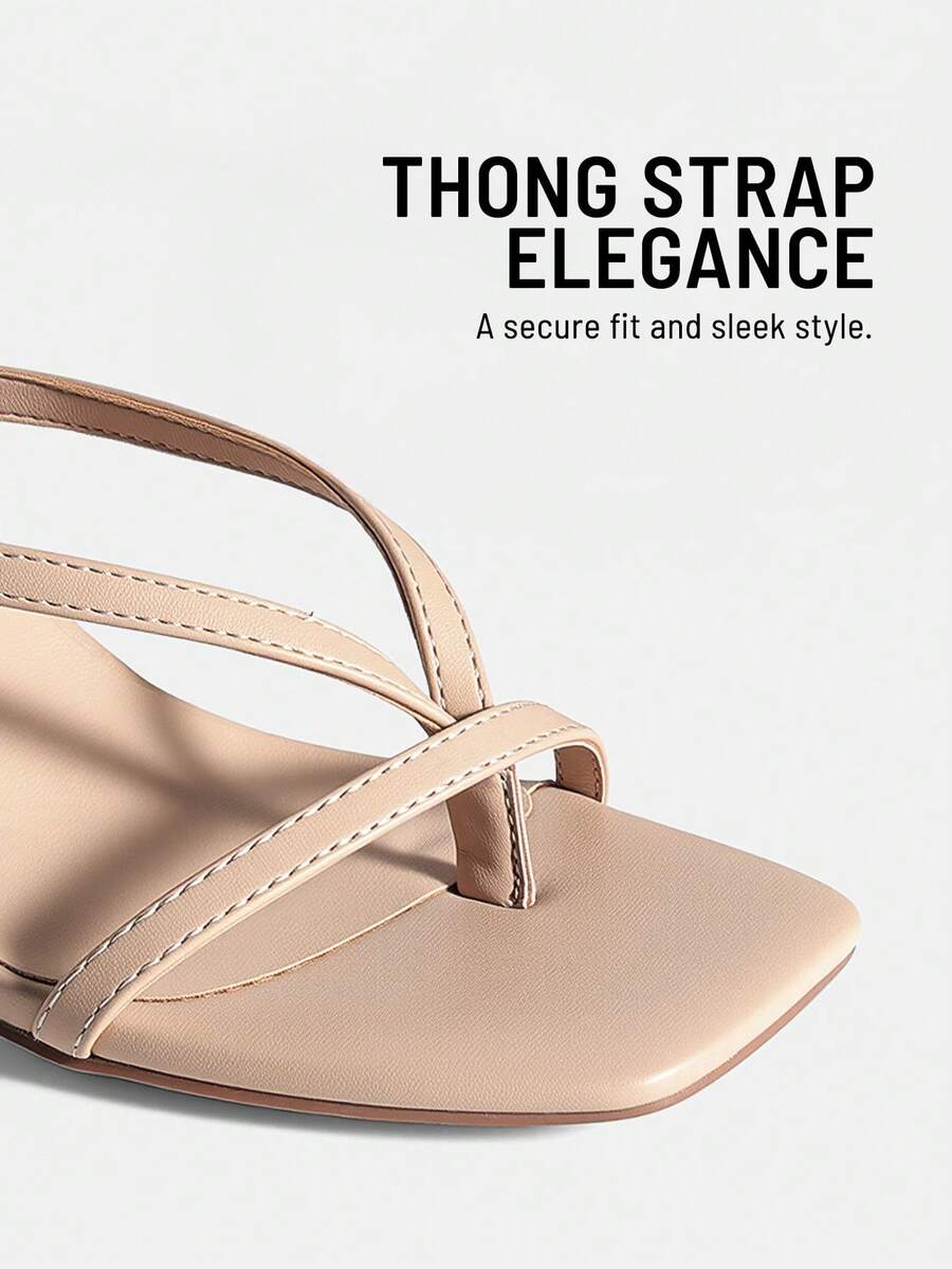 Women's metallic kitten low heel thong sandals featuring an open square toe and slip-on mule design.