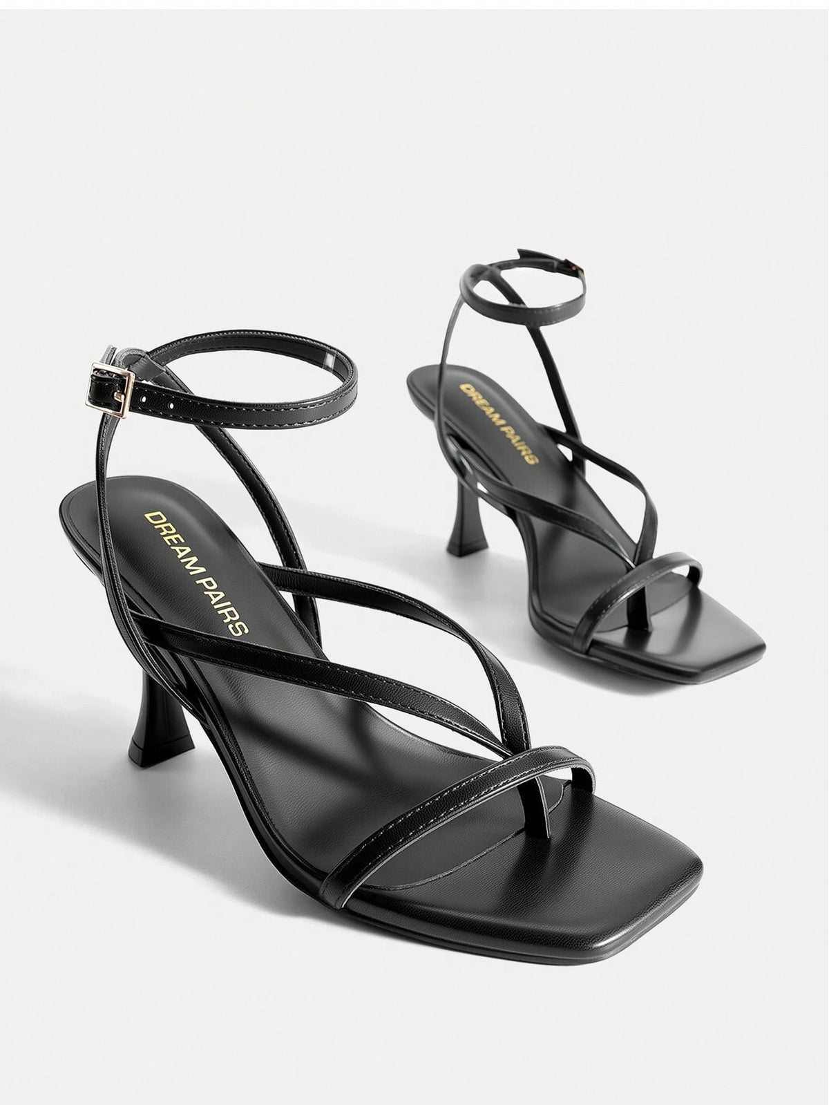Women's metallic kitten low heel thong sandals featuring an open square toe and slip-on mule design.