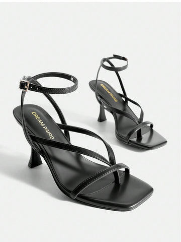 Women's metallic kitten low heel thong sandals featuring an open square toe and slip-on mule design.