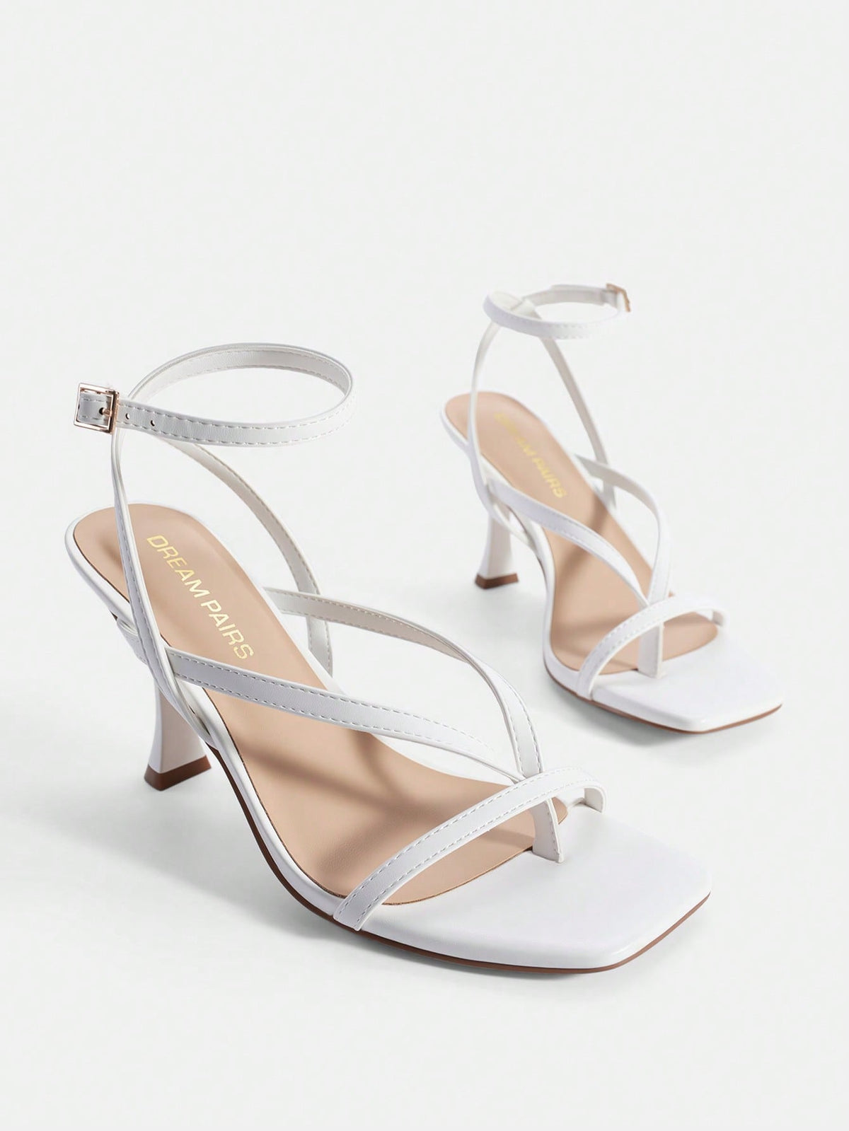 Women's metallic kitten low heel thong sandals featuring an open square toe and slip-on mule design.
