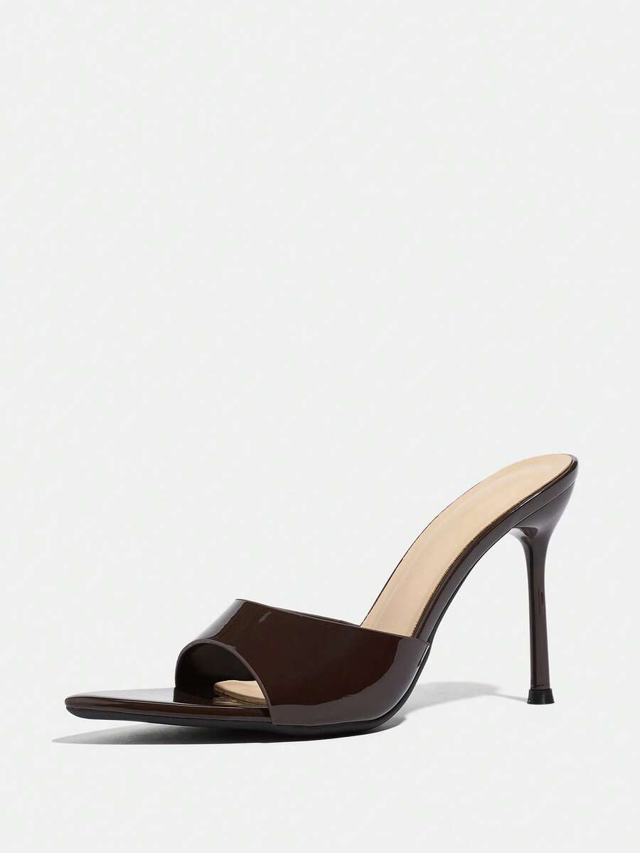 Women's elegant open toe high heel party mules featuring sleek stiletto heels and a slip-on design.