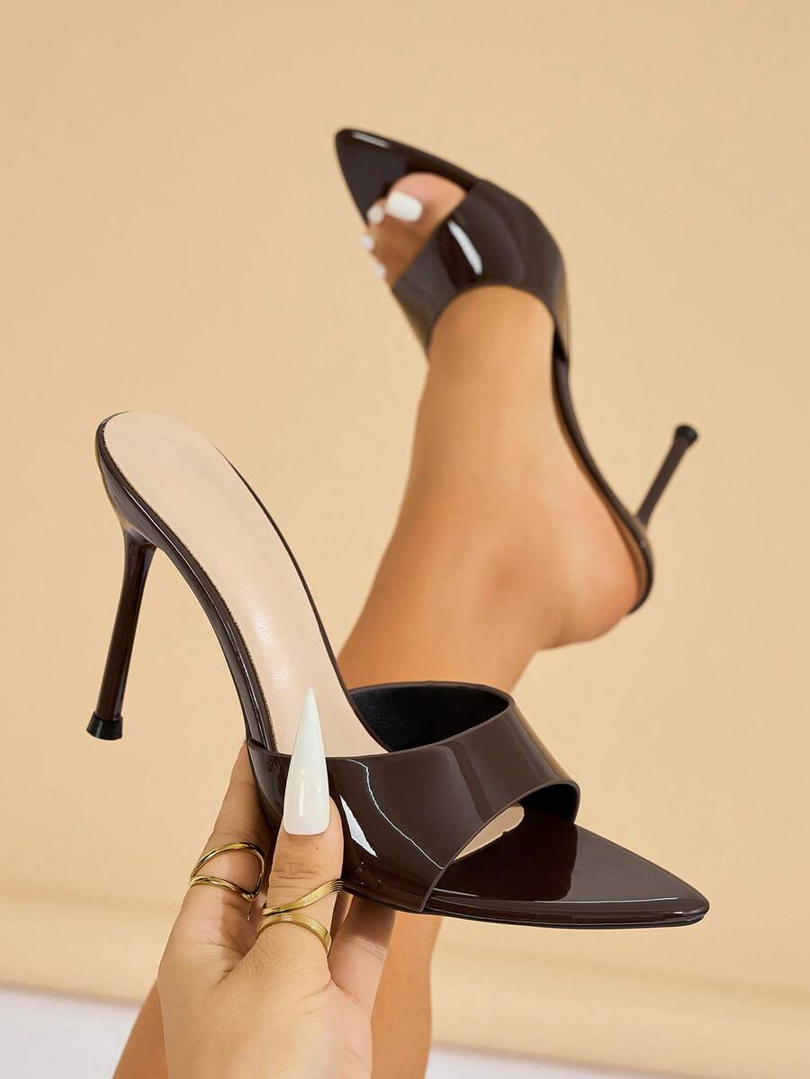 Women's elegant open toe high heel party mules featuring sleek stiletto heels and a slip-on design.