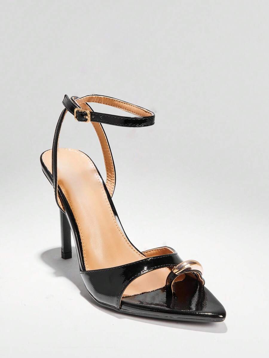 Women's pointed toe stiletto high heel wedding shoes featuring an elegant silhouette and glossy finish.