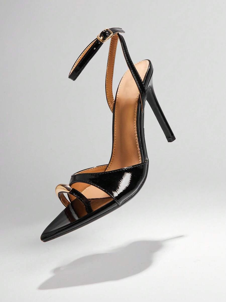 Women's pointed toe stiletto high heel wedding shoes featuring an elegant silhouette and glossy finish.