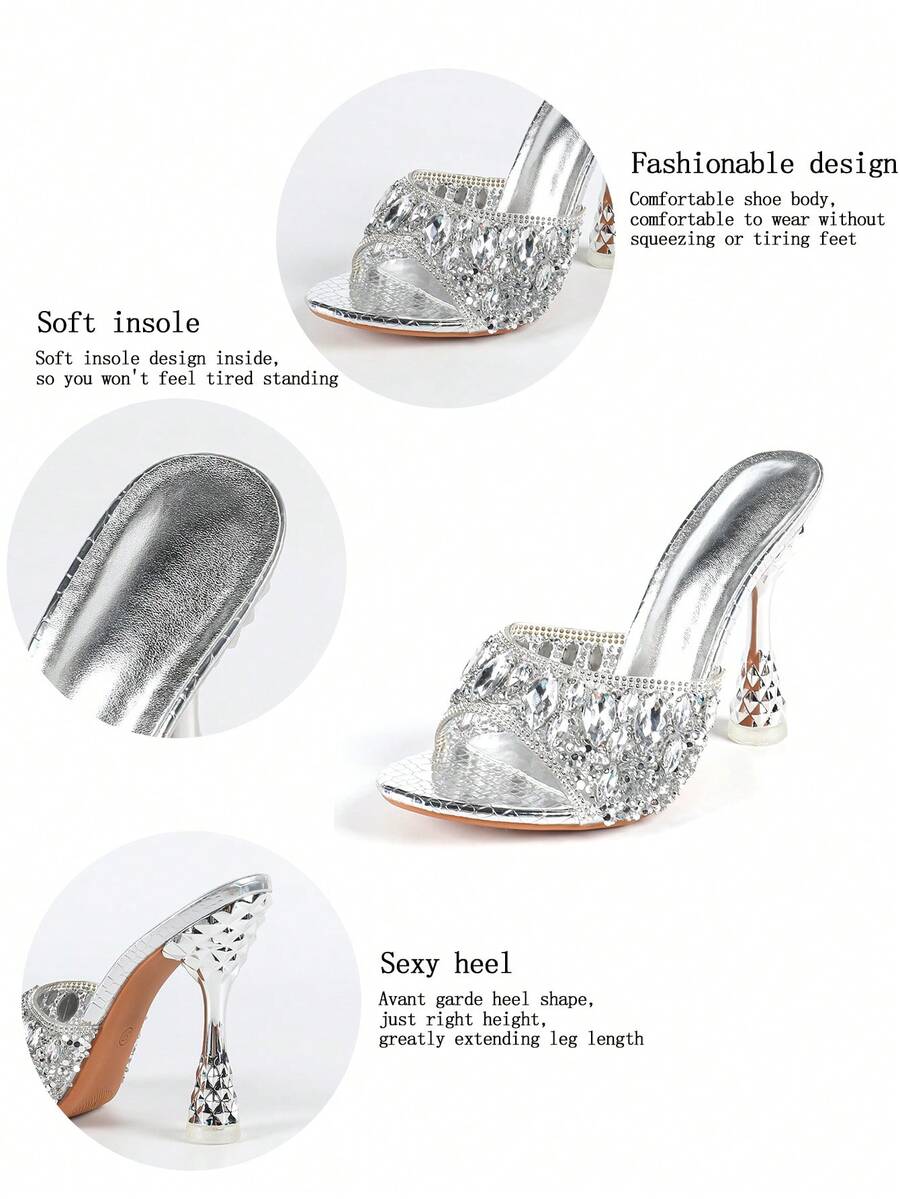 Women's metallic-plated high heeled sandals with shining rhinestone accents, sculptural stiletto heel, and open round toe.