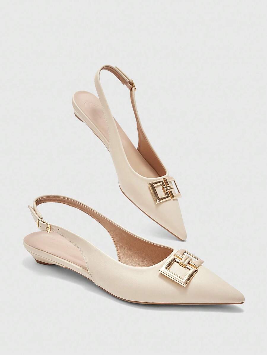 Women's pointed toe low wedge flat shoes crafted in PU leather with a slingback strap and stylish metal buckle detail.