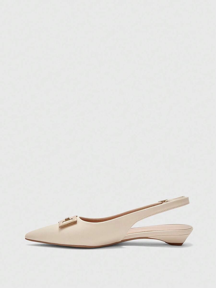 Women's pointed toe low wedge flat shoes crafted in PU leather with a slingback strap and stylish metal buckle detail.