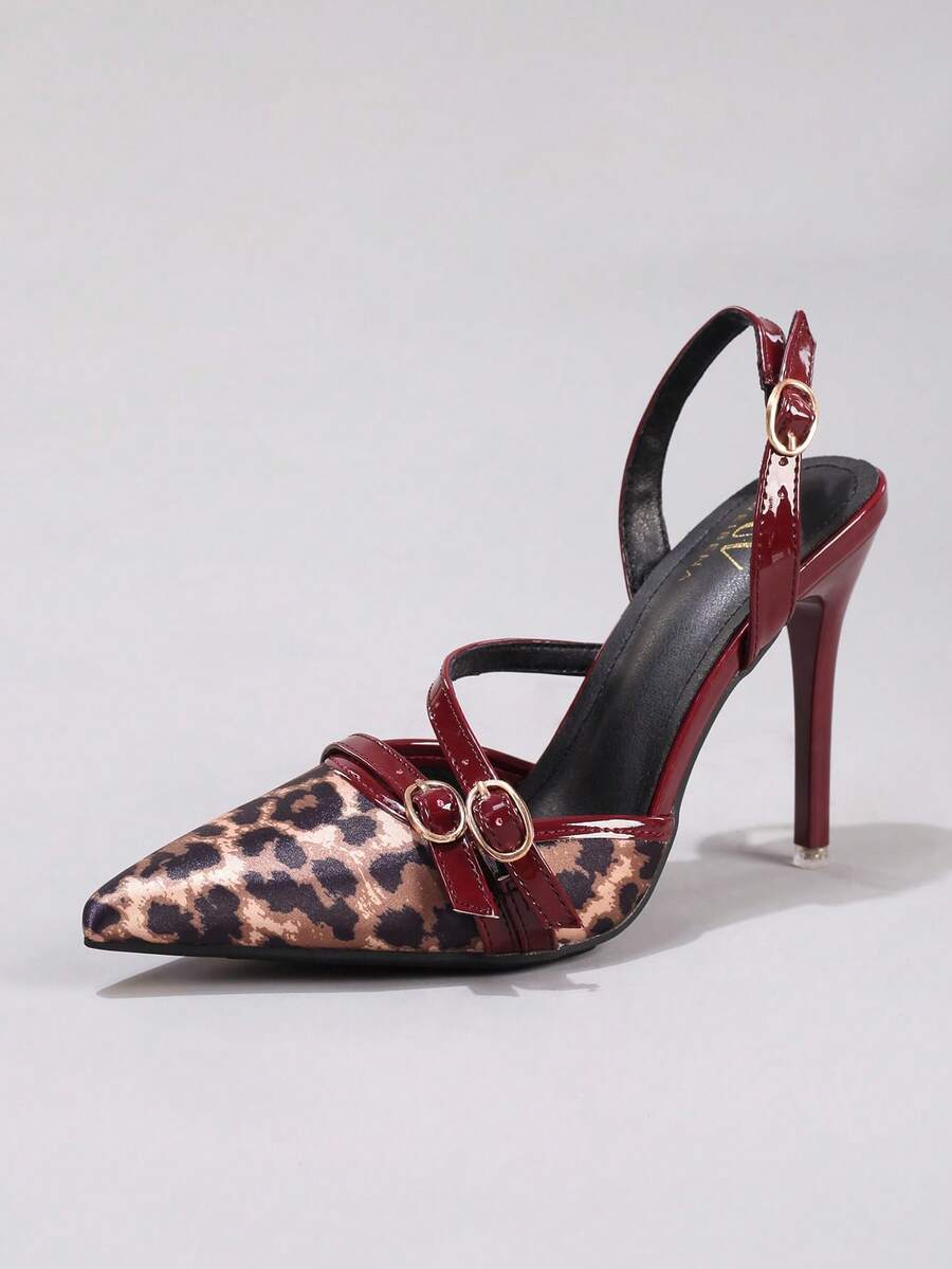 Black lace pointed toe high heel pumps featuring stiletto heels and a decorative bow accent.