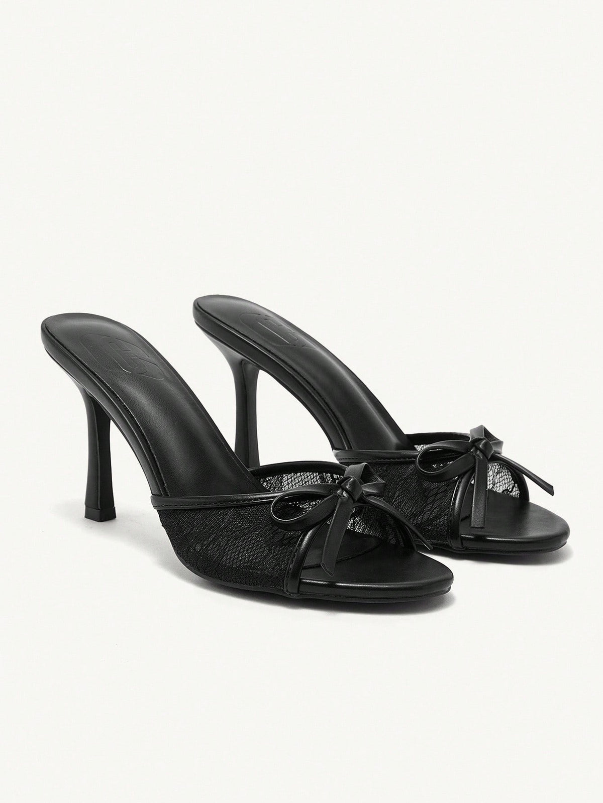 Elegant women's pointed toe high heel mules crafted from smooth PU leather with stiletto heels and delicate bow detail.