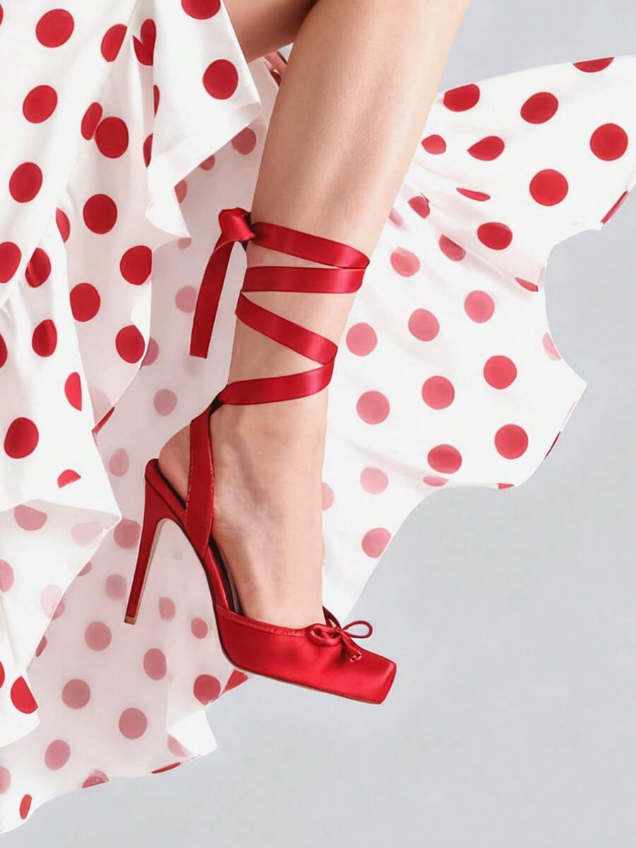 Women's square toe satin ballet stiletto heels with lace-up straps and bow detail.