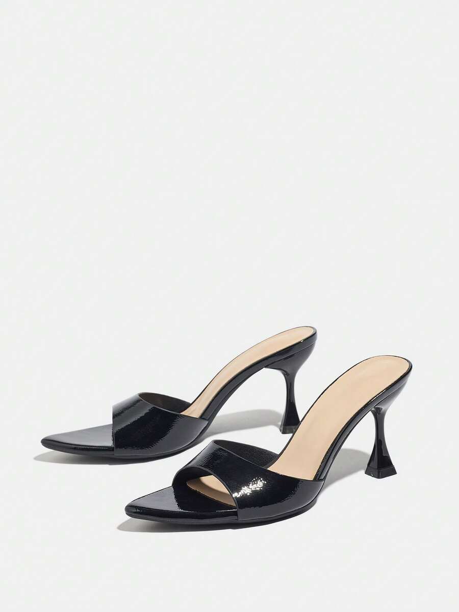 Women's pointed toe high heel mule sandals featuring a sleek slip-on design with elegant lace embroidery detailing
