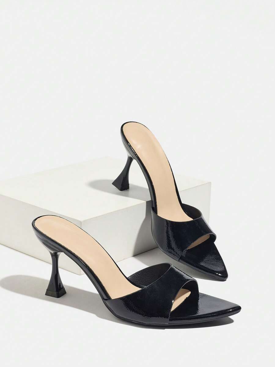 Women's pointed toe high heel mule sandals featuring a sleek slip-on design with elegant lace embroidery detailing