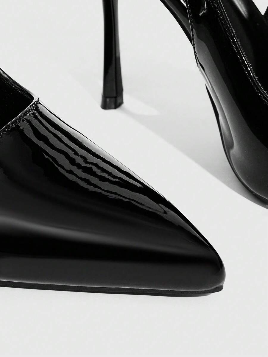 Pointed toe stiletto high heels with slingback silhouette and adjustable buckle ankle strap.