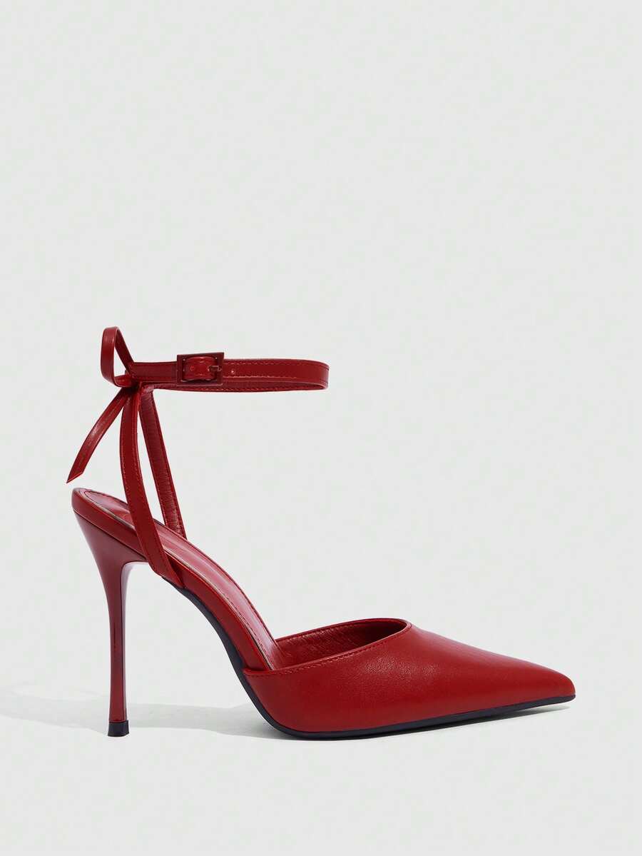 Women's pointed toe ankle strap stiletto high heel pumps featuring smooth PU leather and delicate buckle closure