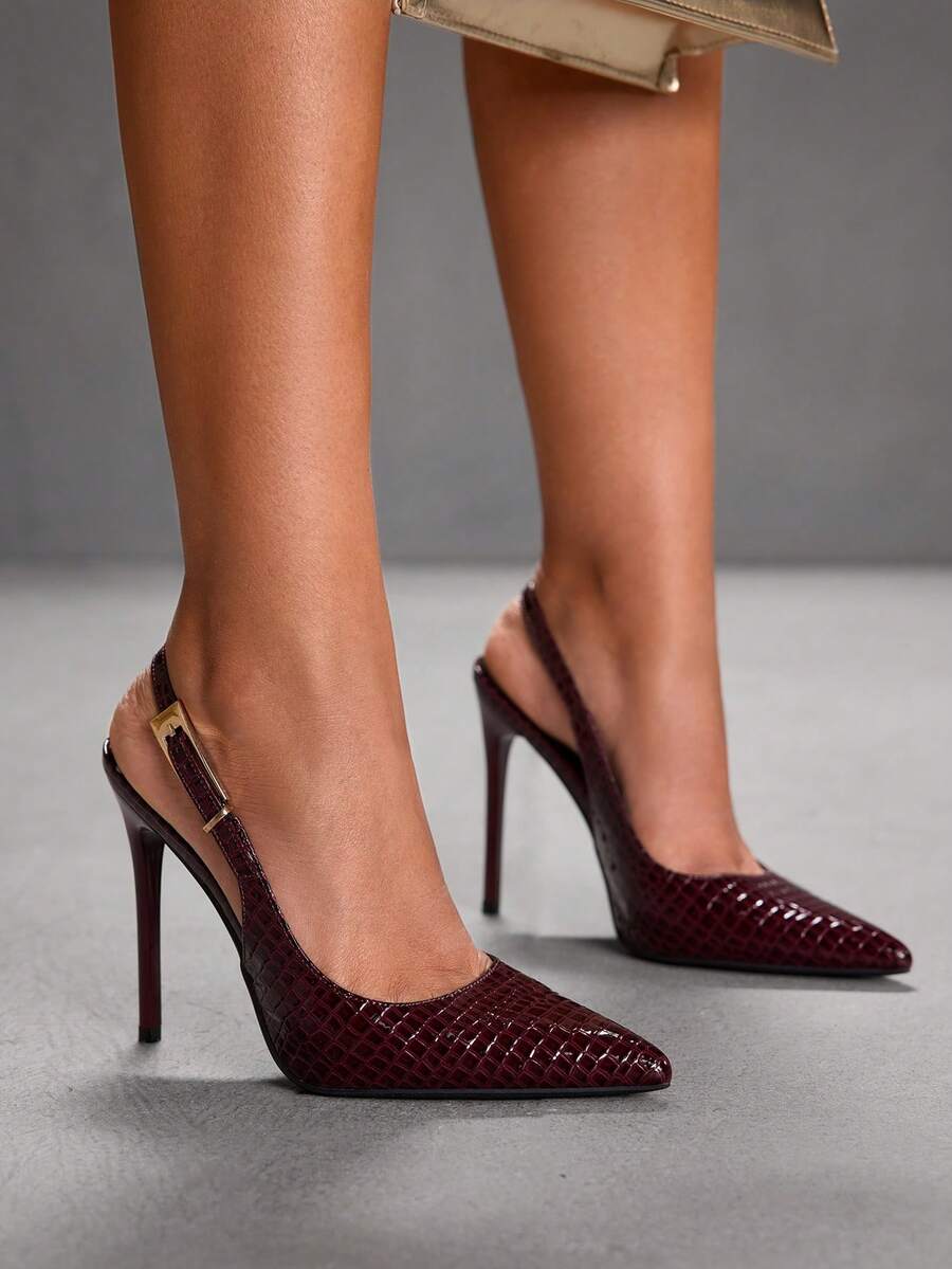 Pointed toe stiletto high heel evening party pumps featuring an ankle strap with buckle closure.