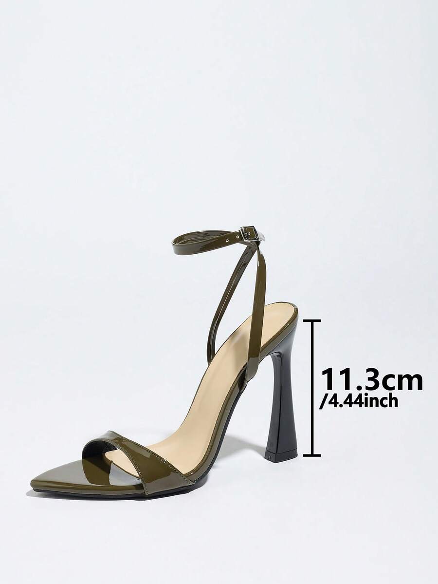 Burgundy open-toe high heels featuring an adjustable ankle strap with buckle closure and high stiletto heel.