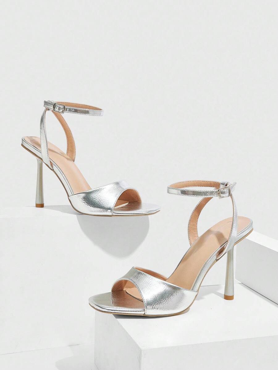 Women's square toe stiletto high heel sandals featuring an open toe design and ankle strap buckle closure.