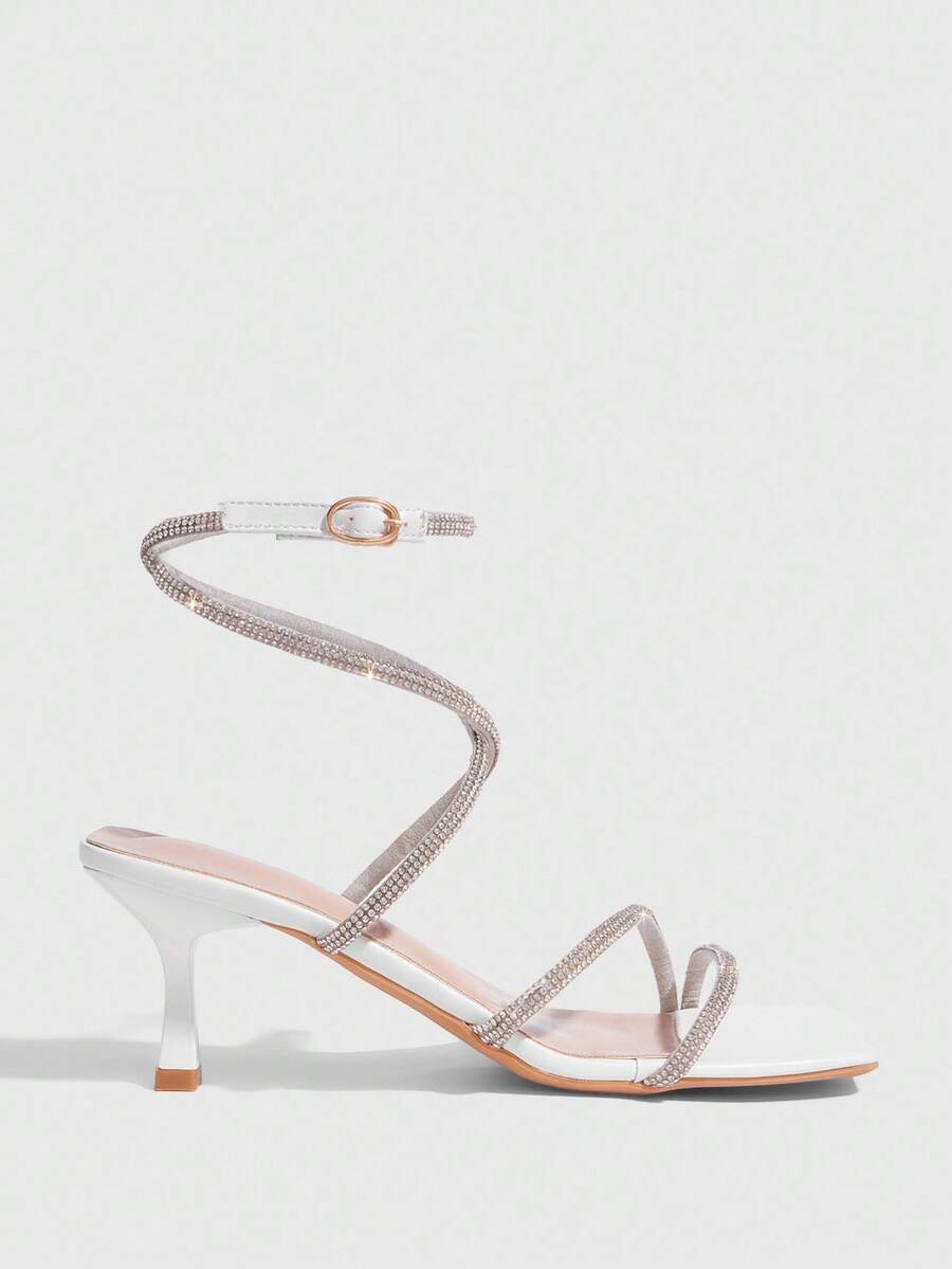 Square toe kitten heel sandals with sparkling rhinestone strap in light gold PU leather