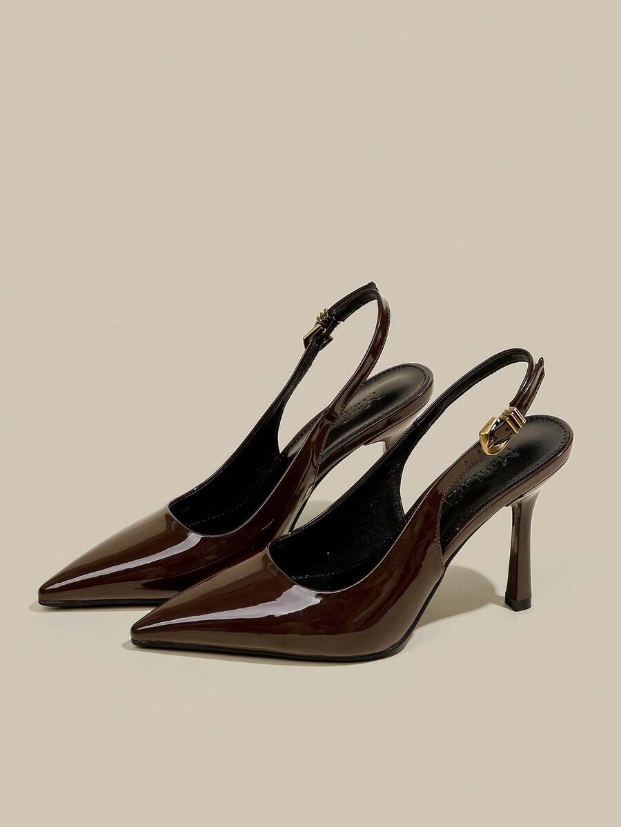 Women's pointed toe kitten heel pumps with adjustable buckle back strap and sleek patent finish.