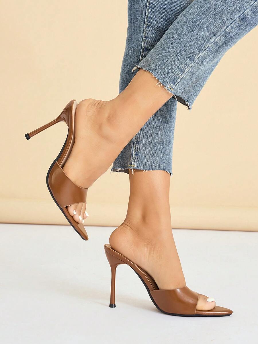 Women's elegant open toe high heel party mules featuring sleek stiletto heels and a slip-on design.