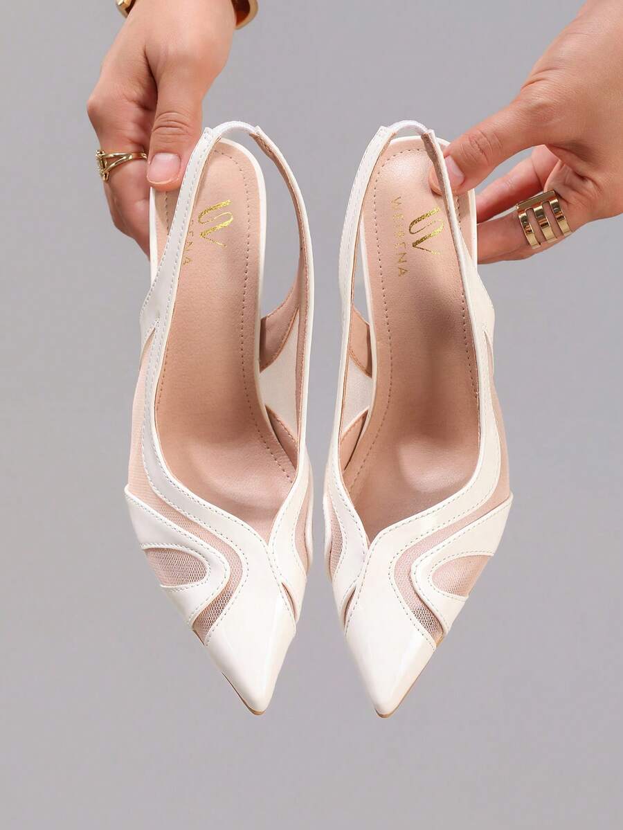 Black lace pointed toe high heel pumps featuring stiletto heels and a decorative bow accent.